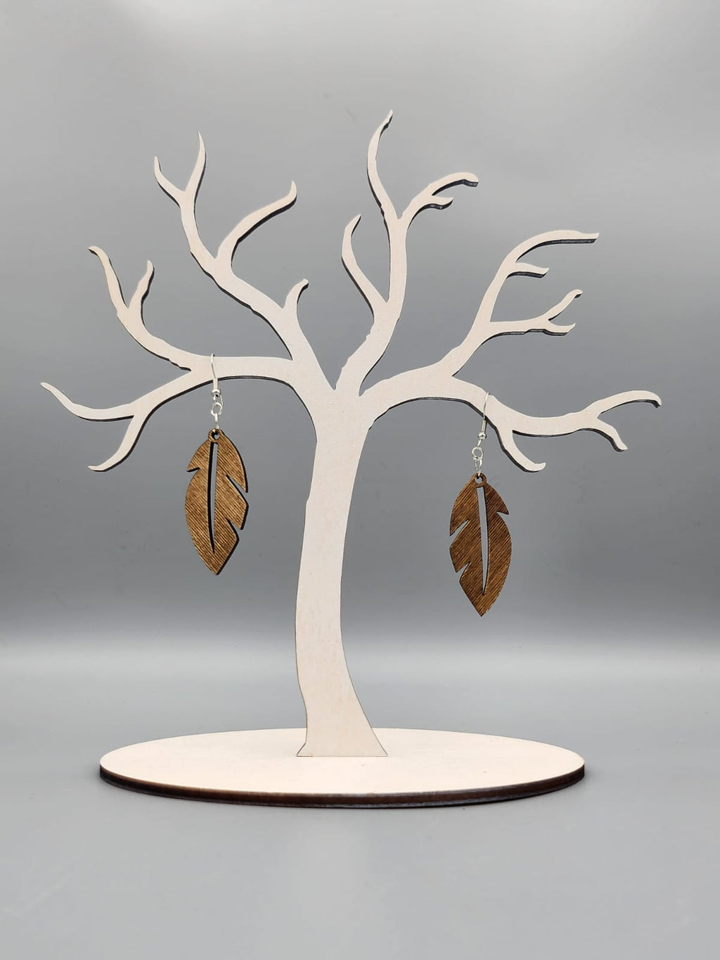 Holz-Ohrringe in Federform