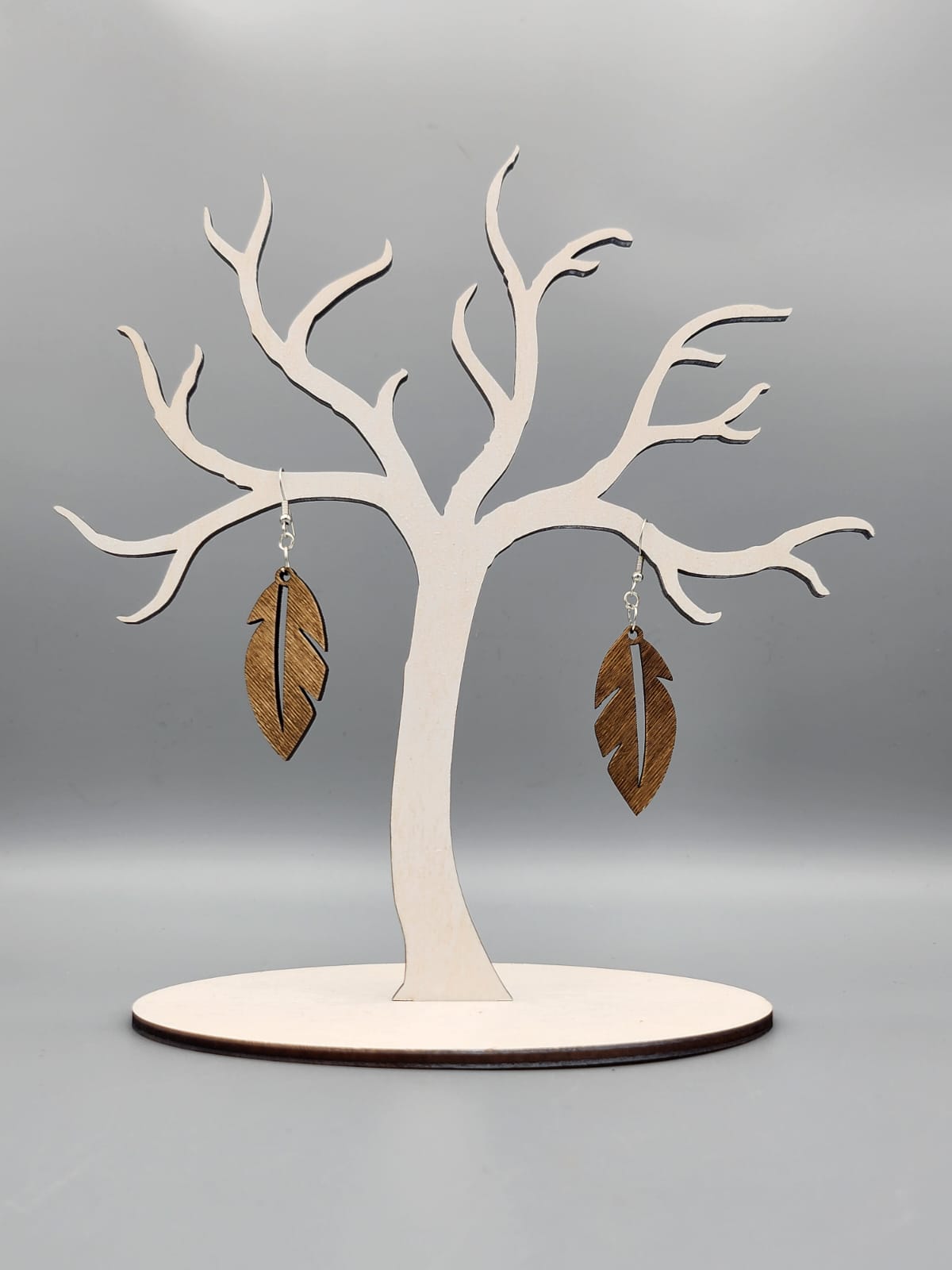 Holz-Ohrringe in Federform